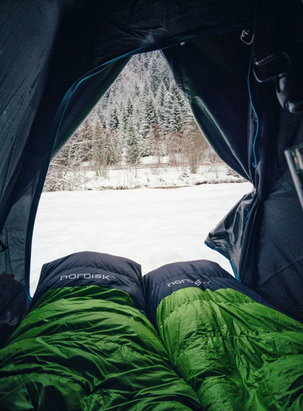2 green sleeping bags