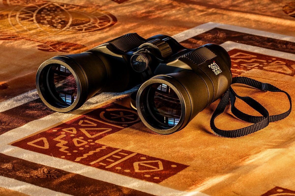 binoculars on a mat
