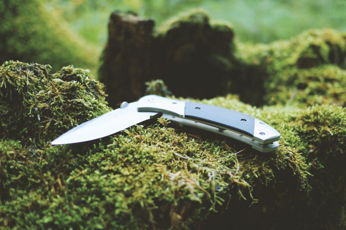 gray and black camping pocket knife