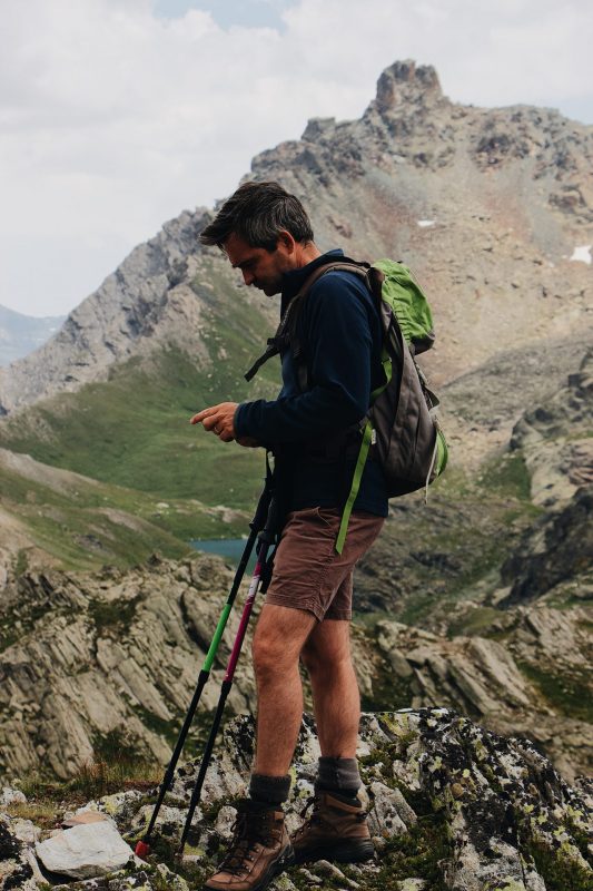 man with two hiking sticks