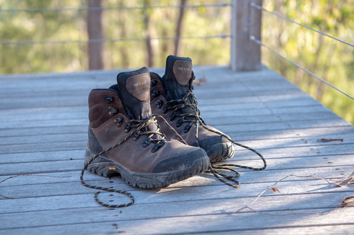 a pair of brown hiking boots