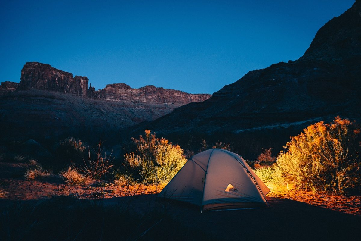 camping in a tent in a remote place