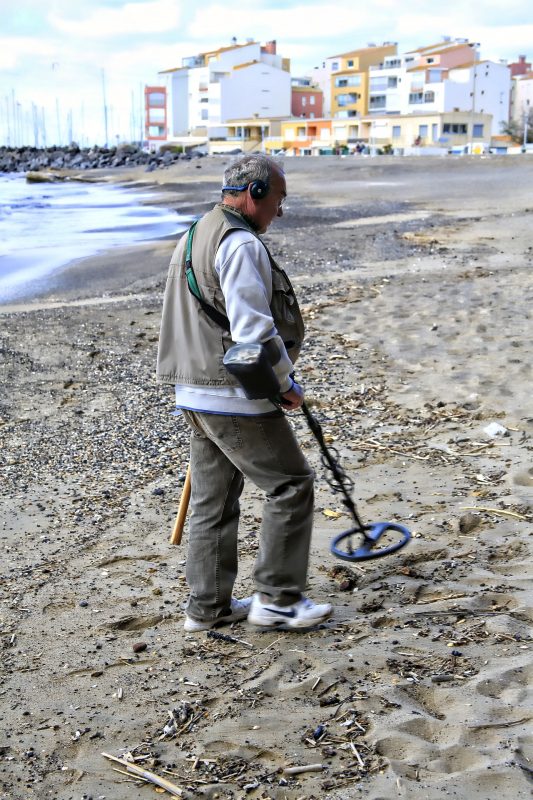 man with a detector