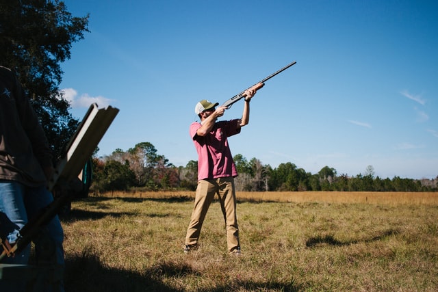 man with hunting gun